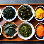**Image of diverse sea vegetables (kelp, nori, etc.) arranged attractively on a plate or in bowls.** Focus on vibrant colors and textures. The image should convey the message of nutritious and delicious food.